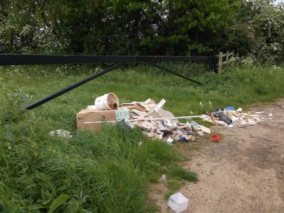 A Northampton man has been fined after rogue building merchants dumped contents of his old bathroom in Castle Ashby.