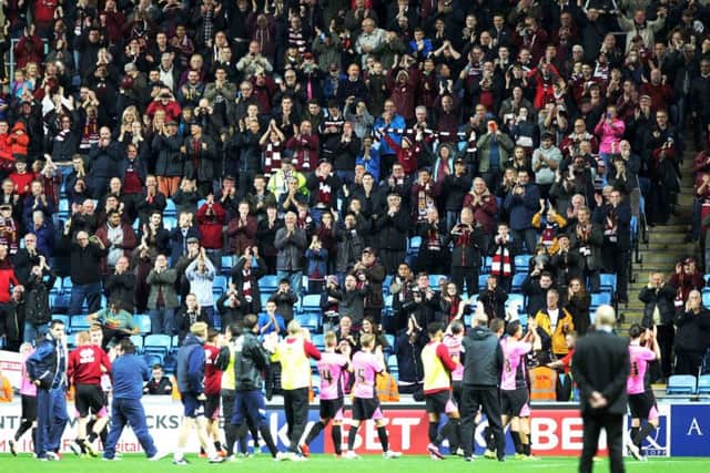 The Cobblers players celebrate following the FA Cup win at Coventry City in November, 2015 (Picture: Sharon Lucey)