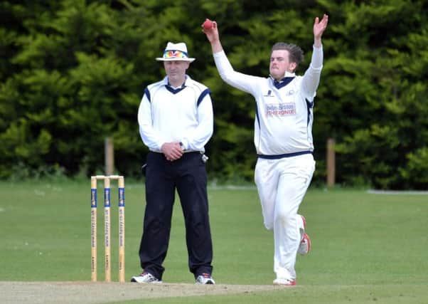 MAIN MAN - Ashley Starmer in action for Brixworth in their win over Saints. Starmer claimed four wickets as the villagers claimed victory (Pictures: Dave Ikin)