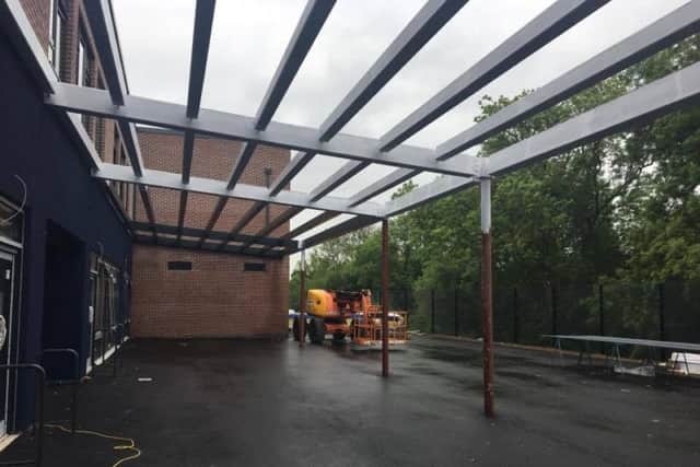When sheltered, this area will be where reception students will use messy play.