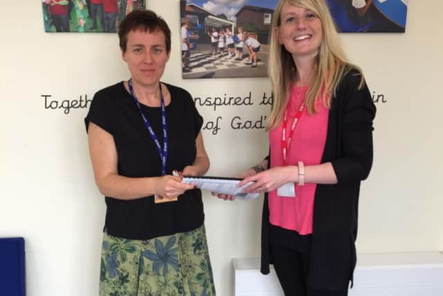 Lisa Pearce, headteacher of Wilby CEVA Primary School, left, and Kate Houghton, Pacesetter wellbeing training manager, right.
