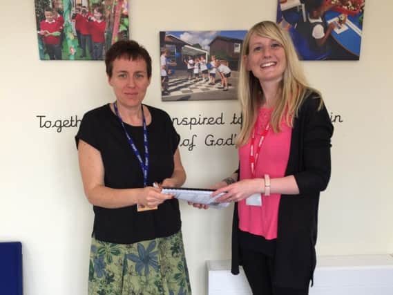 Lisa Pearce, headteacher of Wilby CEVA Primary School, left, and Kate Houghton, Pacesetter wellbeing training manager, right.