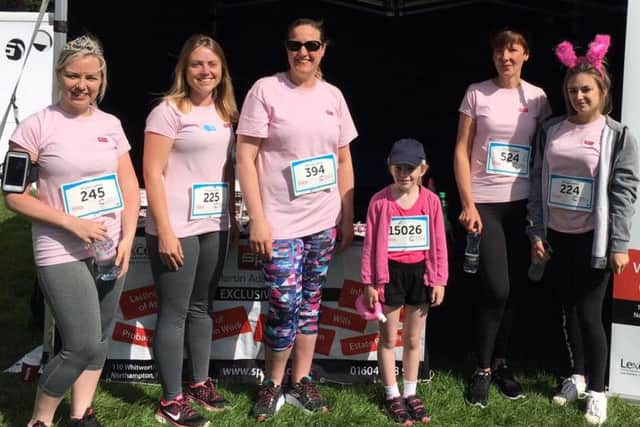 Katy, 8, ran with a team of ladies from her grandfather's law firm, SP Law.