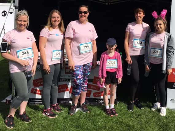 Katy, 8, ran with a team of ladies from her grandfather's law firm, SP Law.