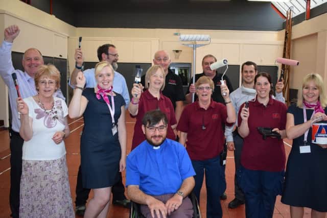 Weston Favell shopping centre staff added a fresh lick of paint to the Emmanuel Church sports hall