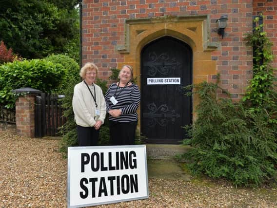 Retired Rosemary Daniel (left) is the presiding officer of the polling station at the home of June Thomas, (right). Winwick's tiny polling station is inside this house.