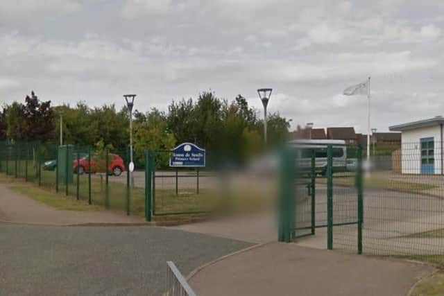 A bag was stolen from a car outside Simon de Senlis Primary School. Two 'twins' were seen looking at cars outside the premises before the incident.