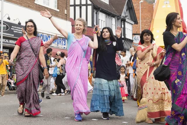 The parade was made of troupes, floats, dancers and live music.