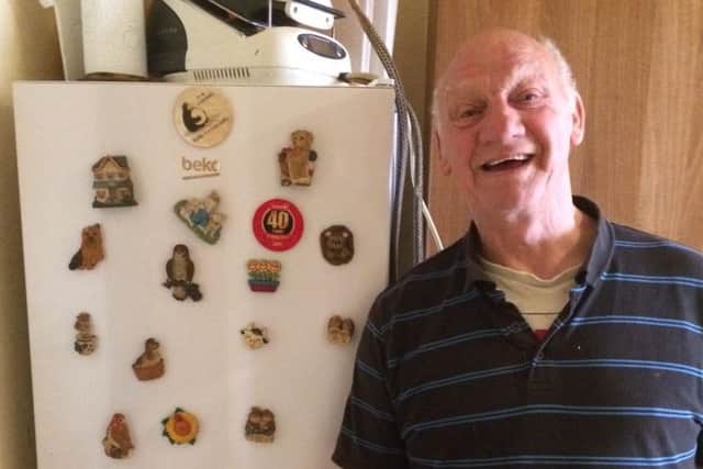 Tony Barrett with his new fridge, donated by an anonymous member of his community.