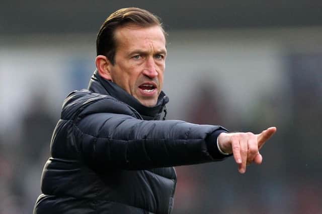 WORKING HARD TO COMPLETE SIGNINGS - Cobblers boss Justin Edinburgh
