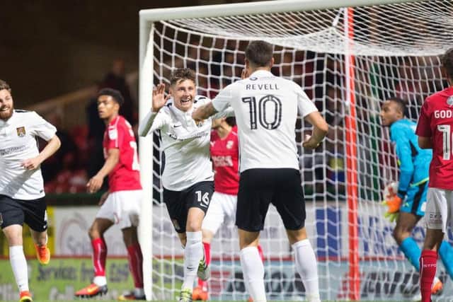 Harry Beautyman celebrates his goal in the win at Swindon Town last season