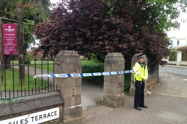 St Giles Courtyard was taped off following the incident.