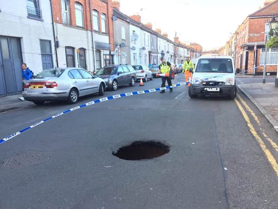 Police were called to the scene of the pothole on Friday night. The void has since widened, but the cause of it is not known