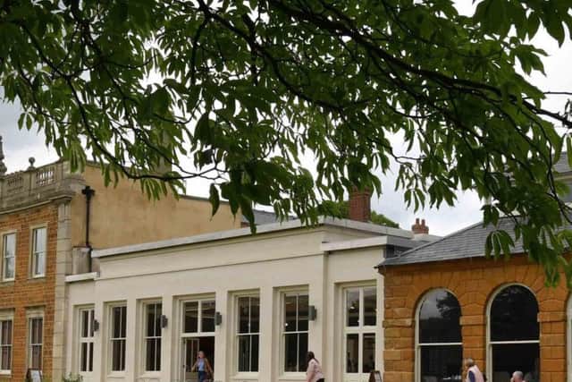 Screens have now been removed from the grounds of Delapr Abbey, allowing an unrestricted view of the refurbished site.