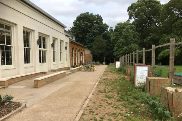 Screens have now been removed from the grounds of Delapr Abbey, allowing an unrestricted view of the refurbished site.