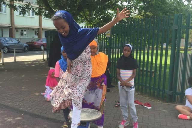 Children got together to enjoy Spring Festival 2017 on Saturday in the Spring Borough estate.