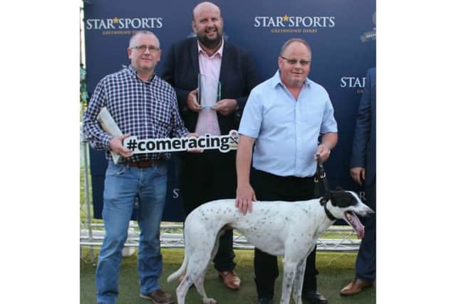 From left to right: Nick Livesey, greyhound operations director; Graham Holland, Clares Rocket trainer; Martin Chapman, Star Sports