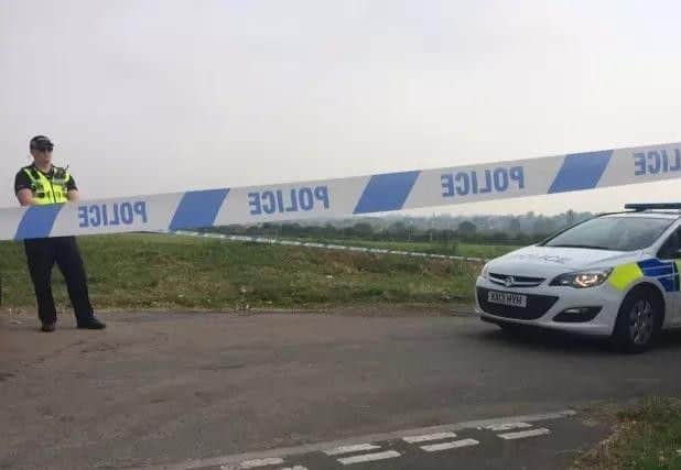 Police at the scene of the stabbing in Mill Lane, Kings Heath.