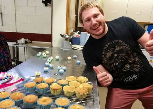 Nathan Williams and his volunteers made cakes to give away to shoppers