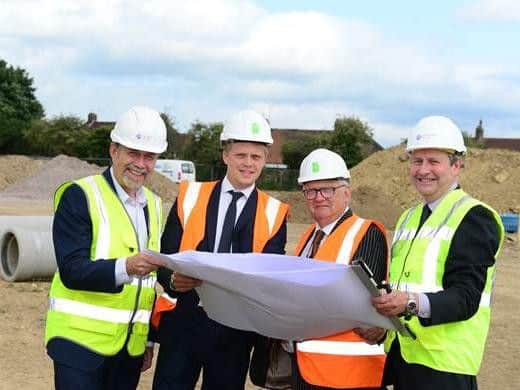 John Henderson (Longhurst Group), Dan Gooch (Westleigh Partnerships), Councillor Stephen Hibbert (Northampton Borough Council) and Jeff Gunthorpe (Longhurst Group), at the site groundbreaking
