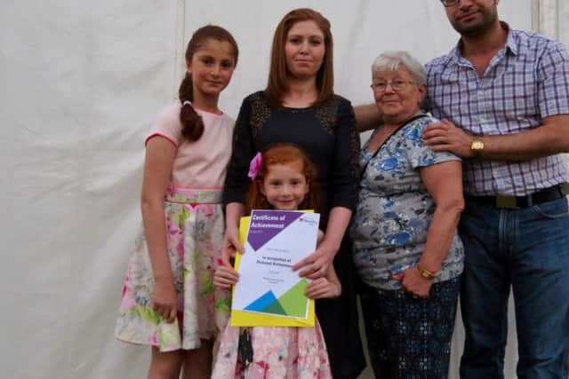 Kurdish student Stira Haj Ibhrahim with her family.