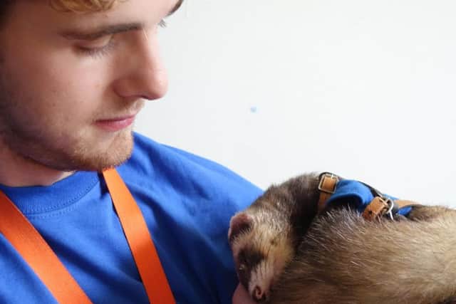 Charlie with a sleepy Bandit.Credit: MND Association please