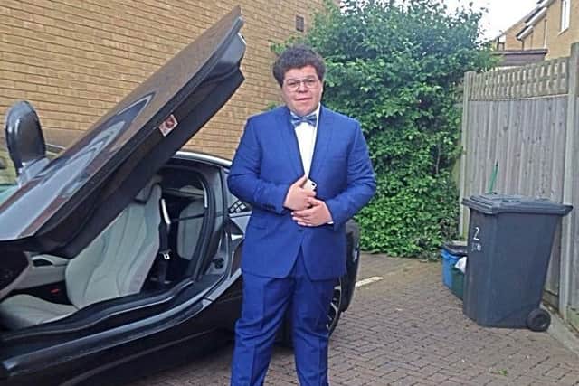 Junior Cameron suited up next to his ride.
