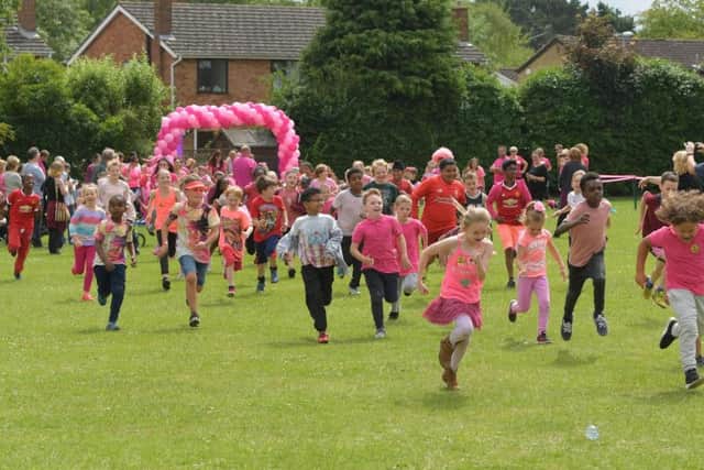 Our photographer snapped pictures of Boothville Primary School children taking part in the Race for Life.