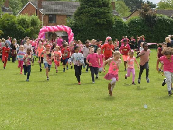 Our photographer snapped pictures of Boothville Primary School children taking part in the Race for Life.