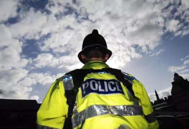 A man was assaulted and robbed in Balmoral Road