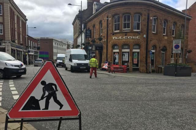 The scene at the junction of Derngate and St Giles Street this morning.