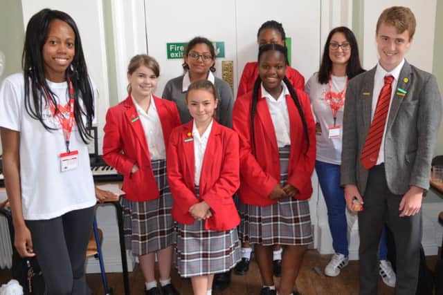 Lorraine Lewis with Quinton House School pupils