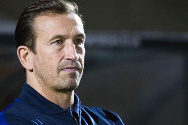 BACK IN THE DUGOUT - Cobblers boss Justin Edinburgh