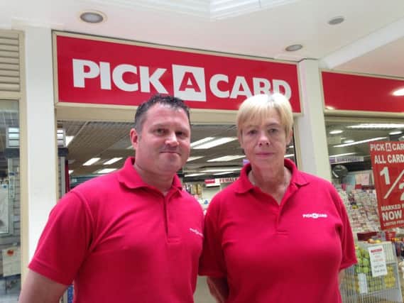 Pick a Card owner Brian Wilson, pictured with staff member Teresa Whitestone, has decided to shut up shop in Northampton as the opening of the Rushden Lakes development nears.