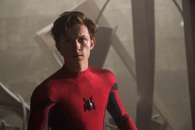 Tom Holland as Peter Parker