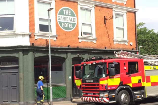 Two crews were called the scene after a cooling unit in the cellar caught fire.