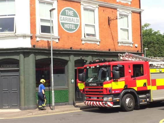 Two crews were called the scene after a cooling unit in the cellar caught fire.