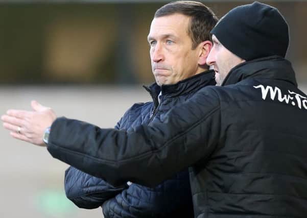 Justin Edinburgh gave Regan Poole his Football League debut as a 16-year-old when he was manager of Newport County