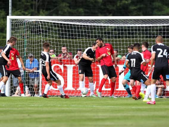 Joe Iaciofano scores the first of his three goals in Saturday's friendly win. Picture by Sharon Lucey