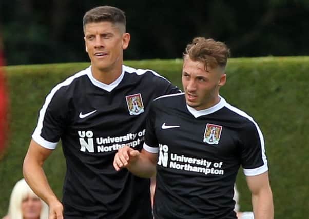 The Cobblers wore their new black away kit for the first time in Saturday's friendly at Sileby Rangers, and they will launch their new home kit later this month