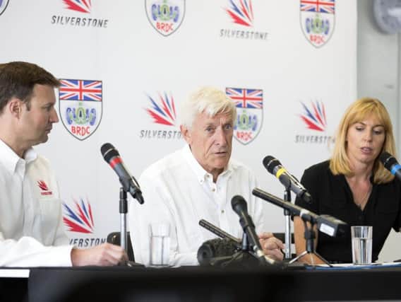 Chairman of the BRDC, John Grant (centre) announcing the split from the contract with Formula One's owners today.