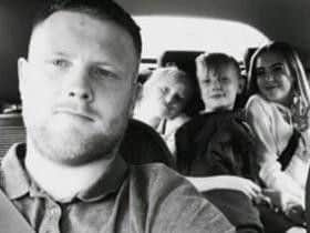 Daniel Butcher with his three children.