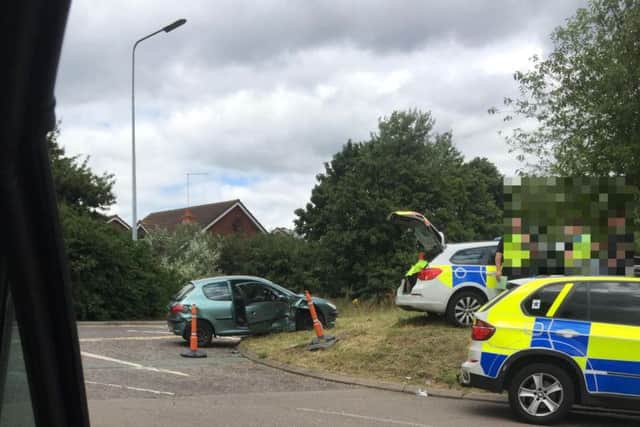 A car has been badly damaged after an incident involving the police.