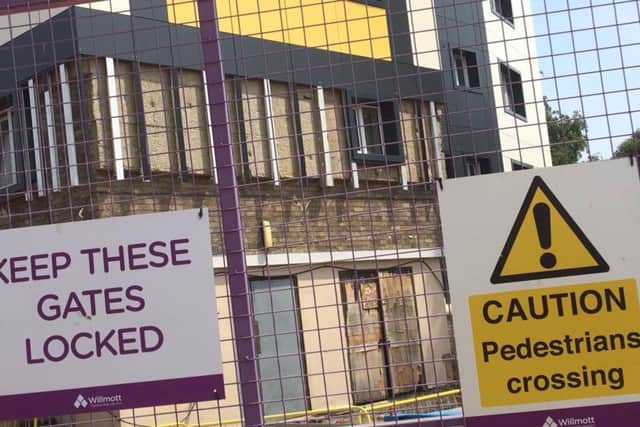 St Katherine's Court in Spring Boroughs is set to have sprinklers installed. The borough council has pledged to review its planning guidelines to make the safety systems mandatory.