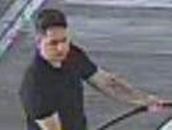The man pictured is wanted by police in connection with the incident.