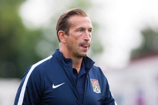 Justin Edinburgh on the touchline at Frome. Picture by Kirsty Edmonds