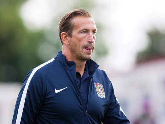 Justin Edinburgh on the touchline at Frome. Picture by Kirsty Edmonds
