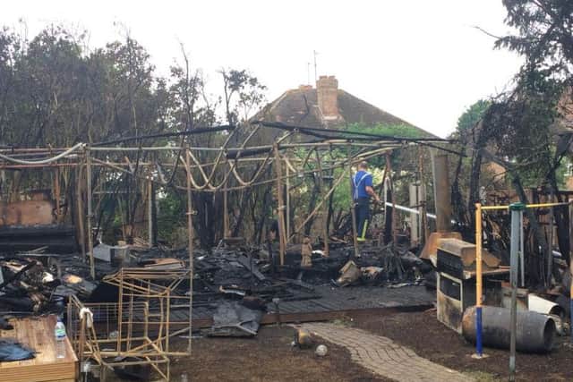 A private backyard pub with a jacuzzi and bar was destroyed in the blaze.