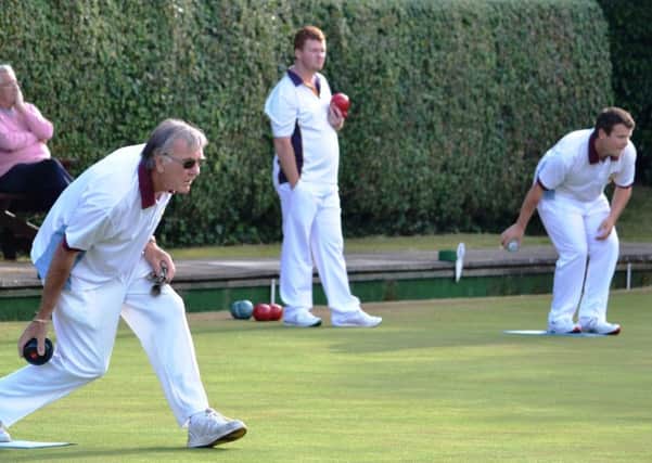 Action from the County Mens Pairs quarter-finals featuring Alan Ashby in foreground, Connor Cinato (red bowl in hand) and Jamie Walker