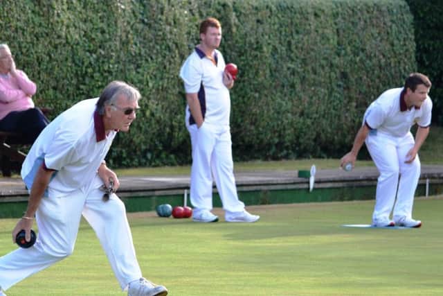 Action from the County Mens Pairs quarter-finals featuring Alan Ashby in foreground, Connor Cinato (red bowl in hand) and Jamie Walker